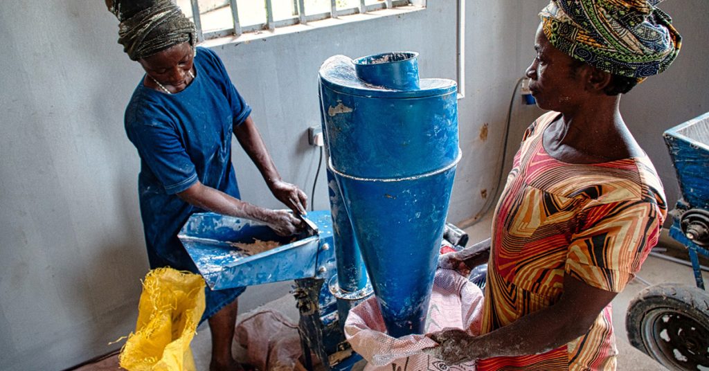 Hammer Mill with operators, Farm Warehouse, Nigeria, March 2025